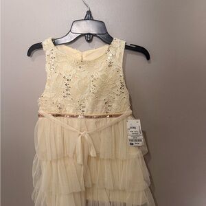 Elegant Cream Sleeveless Dress with Sequins